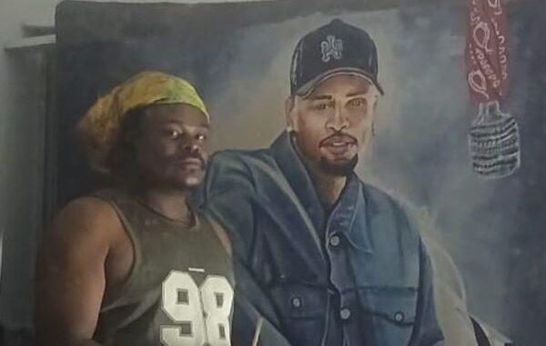Rasta Displays His Painting of Chris Brown (Photos) 1 "Rasta Displays His Painting of Chris Brown (Photos)"